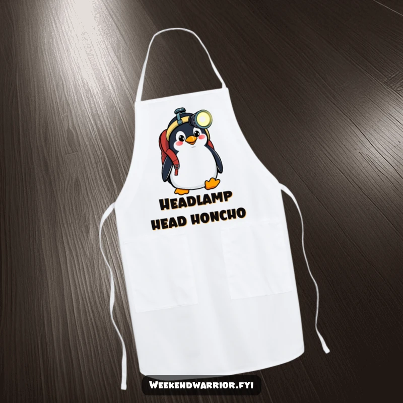 Funny apron featuring a goofy penguin with a backpack and headlamp, ready for culinary adventures with a humorous touch.