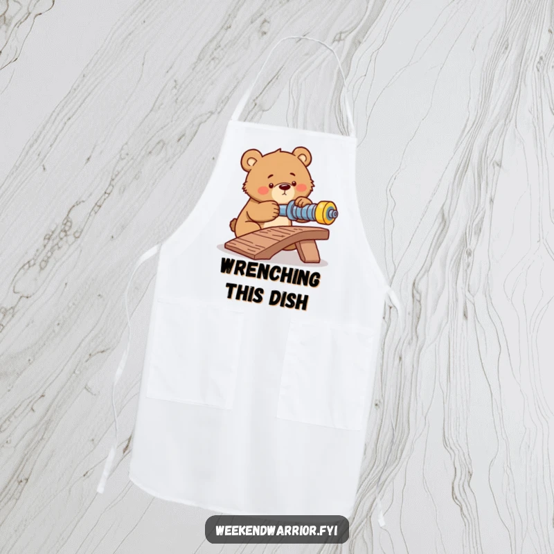 Funny apron adorned with a determined bear tightening a bolt on a makeshift ramp, symbolizing focus and effort.