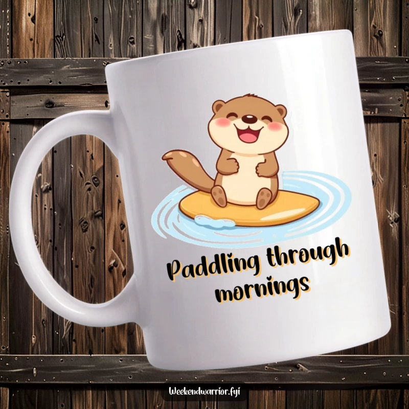 Funny mug depicting a happy otter character jubilantly paddleboarding across a shimmering blue pond with great glee.