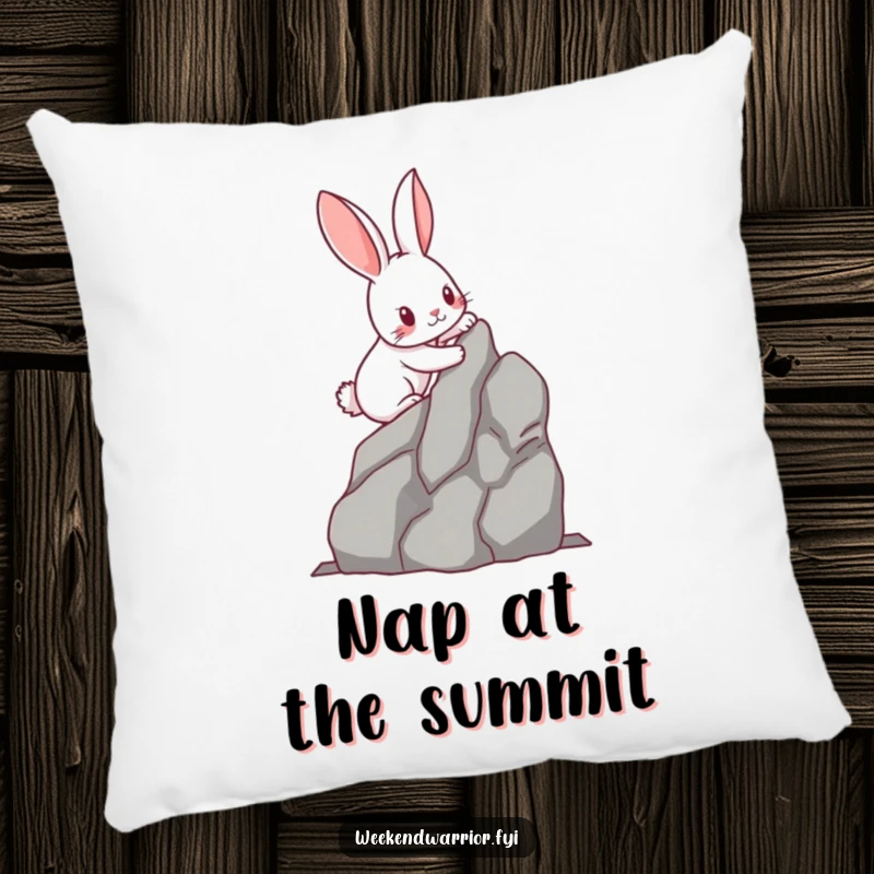 Funny kawaii rabbit with determined paws scaling a miniature rock face, on a soft pillow. Adds comfort and humor to any room.