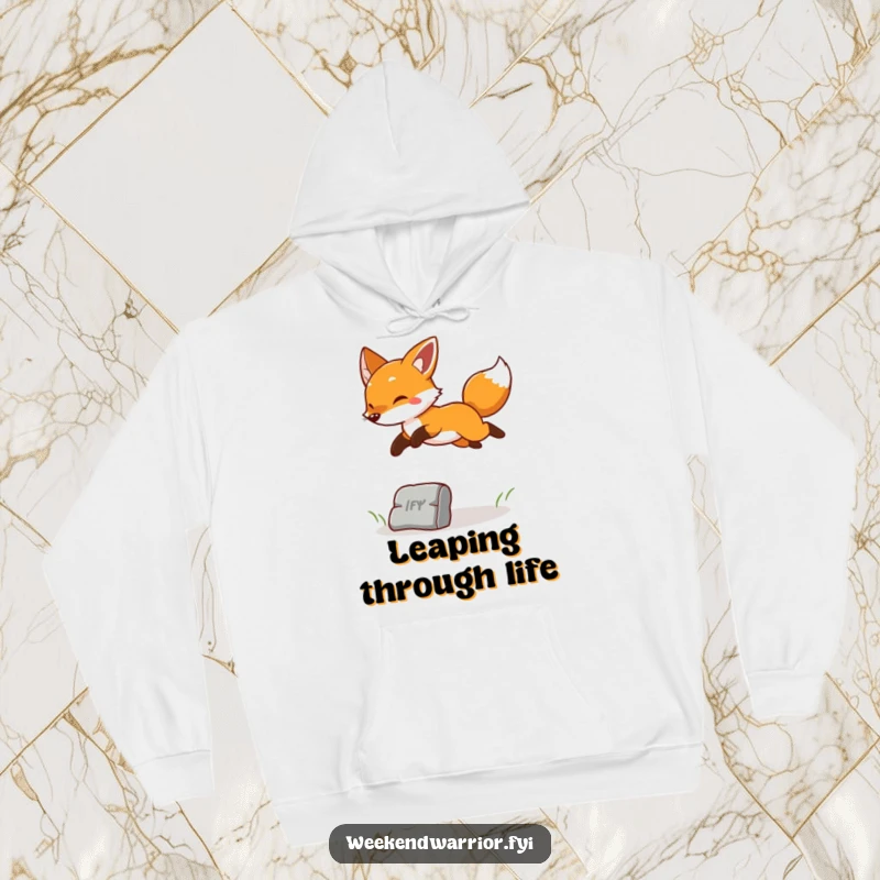 Funny hoodie adorned with a cheerful fox leaping playfully over an obstacle, exuding pure joy and energy.