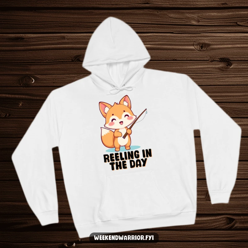 Funny hoodie featuring a cute, excited kawaii fox holding a fishing rod, ready for a fishing expedition with cozy charm.