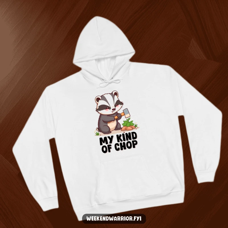 Funny kawaii badger enthusiastically hacking a small bush with a tiny axe, depicted on a warm and comfortable hoodie. Great for outdoor fun.