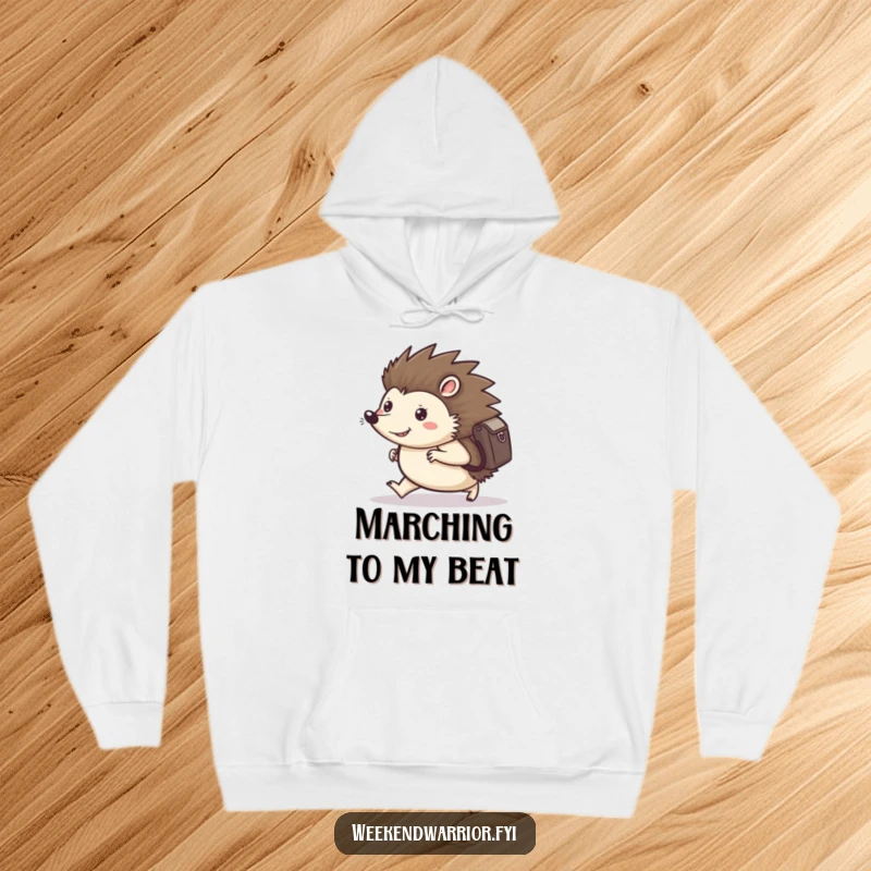 Funny hoodie featuring a happy hedgehog with a backpack, marching forward with determined steps, offering cozy motivation for any adventure.