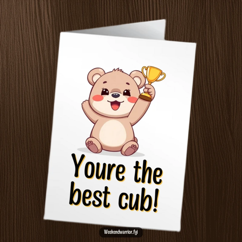 Funny Free Printable Birthday Card: Adorable bear cub victoriously holding a small trophy, celebrating a win with glee.