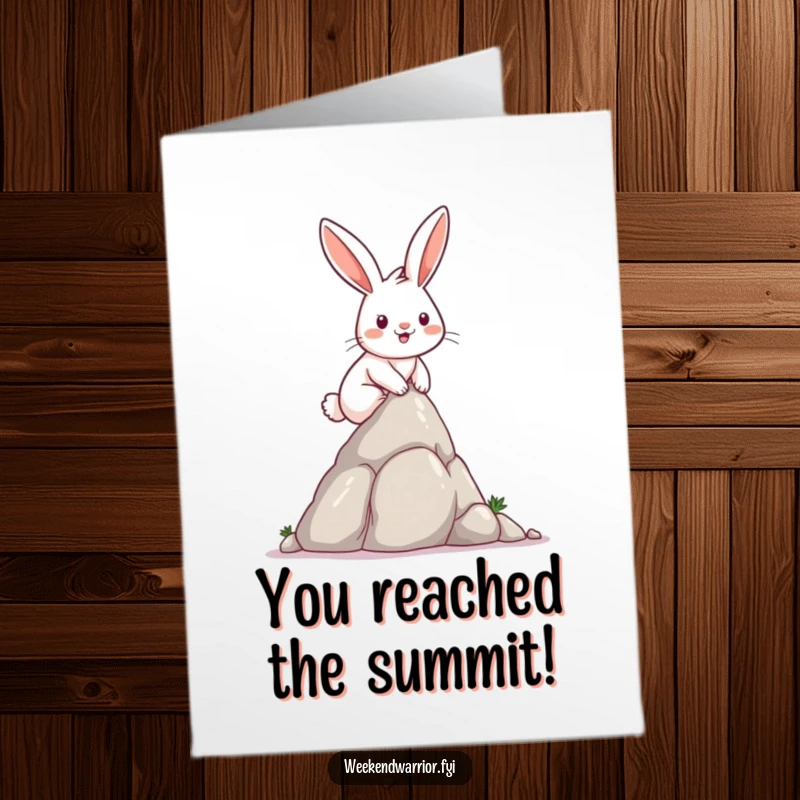 Funny free printable congratulations card: A determined rabbit smiles victoriously after successfully scaling a small rock formation.