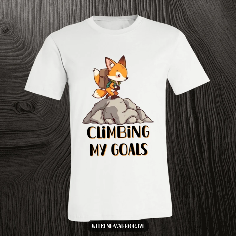 Funny Fox T-Shirt showing a determined fox with a backpack, conquering a rocky climb with impressive focus.