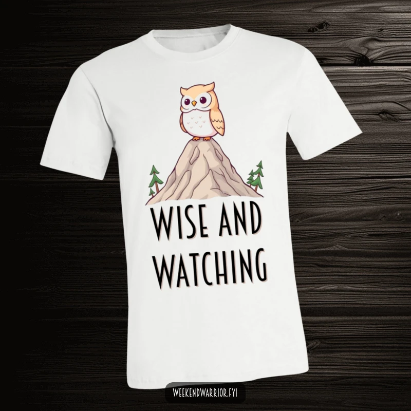 Funny Kawaii owl t-shirt, depicted wisely surveying a landscape from atop a miniature mountain, embodying peace and adventure.