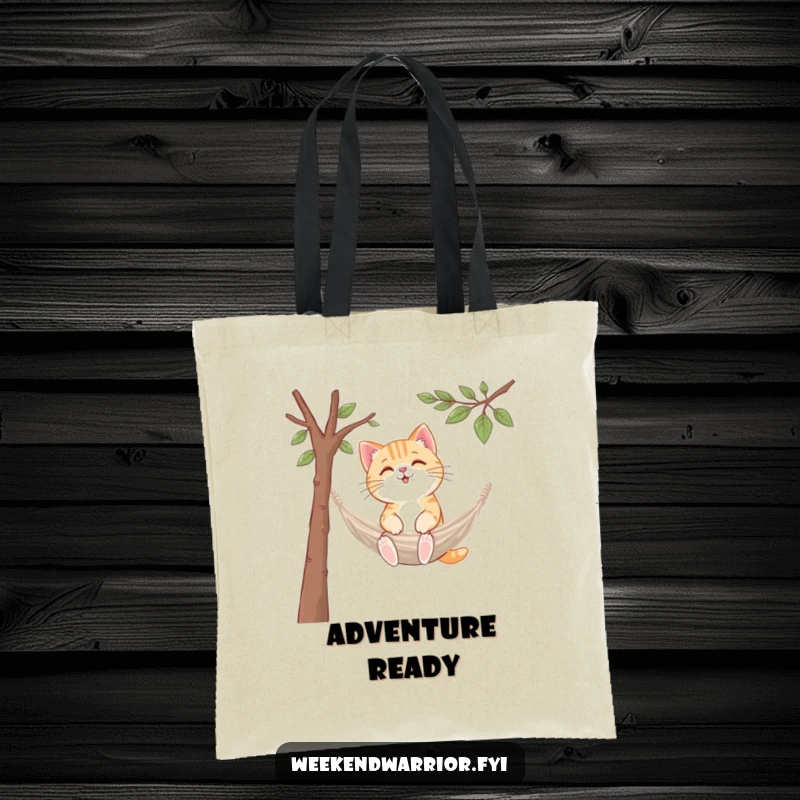 Funny kawaii cat tote bag, setting up a tiny hammock between branches, ready for relaxation.