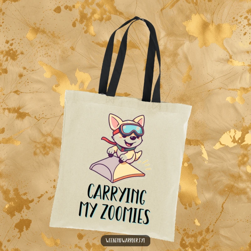 Funny tote bag showing a smiling dog wearing goggles and zipping down a small ramp, ideal for carrying items.