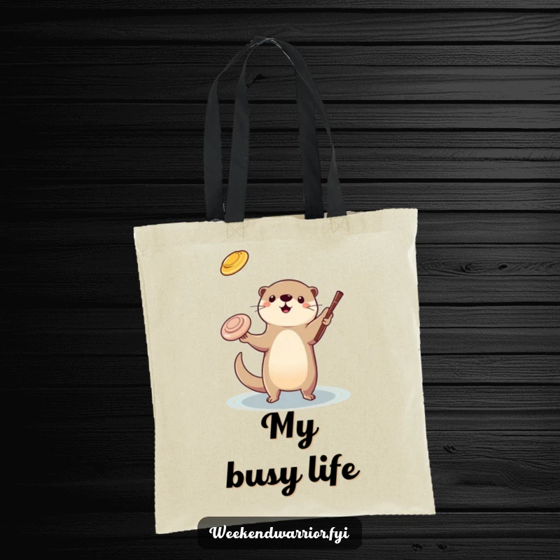 Funny otter juggling tote bag featuring a playful otter skillfully tossing a frisbee and a stick, perfect for carrying daily items.