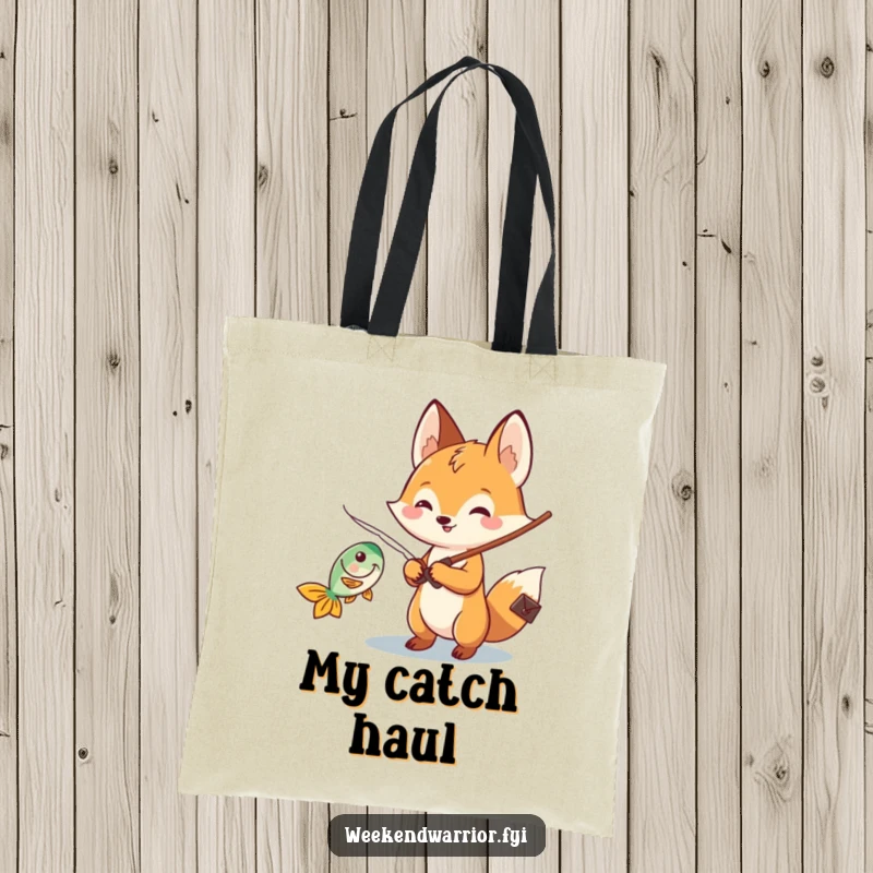 Funny Kawaii fox tote bag featuring a cheerful character holding a fishing rod and reeling in a fish, ready for adventures.